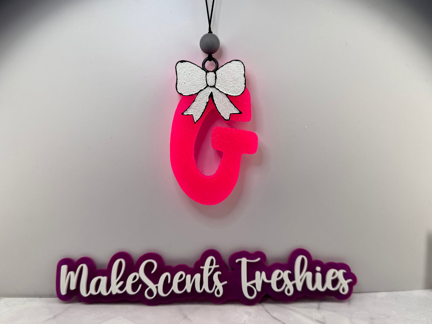 "G" Freshie with a Bow