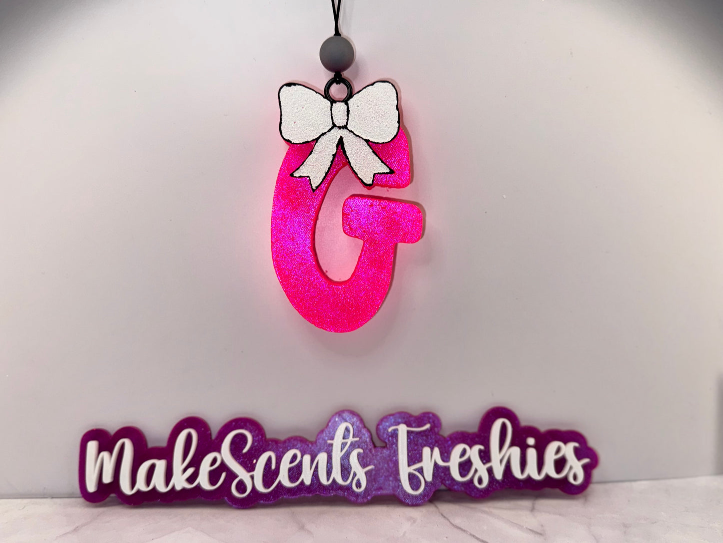 "G" Freshie with a Bow