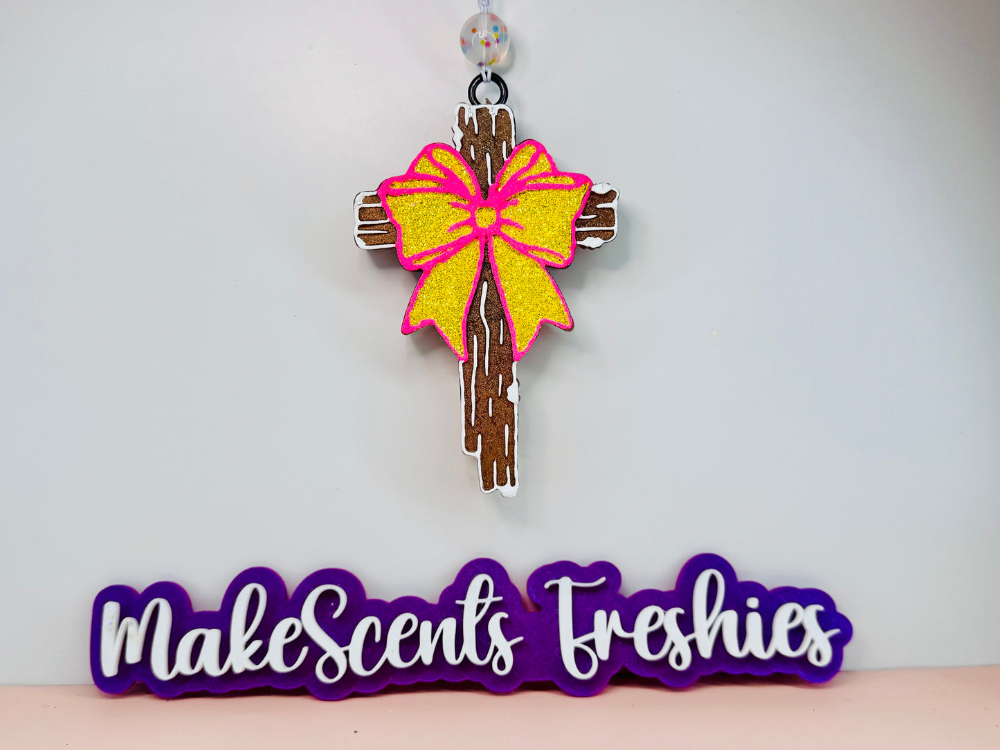 Wood cross with a bow