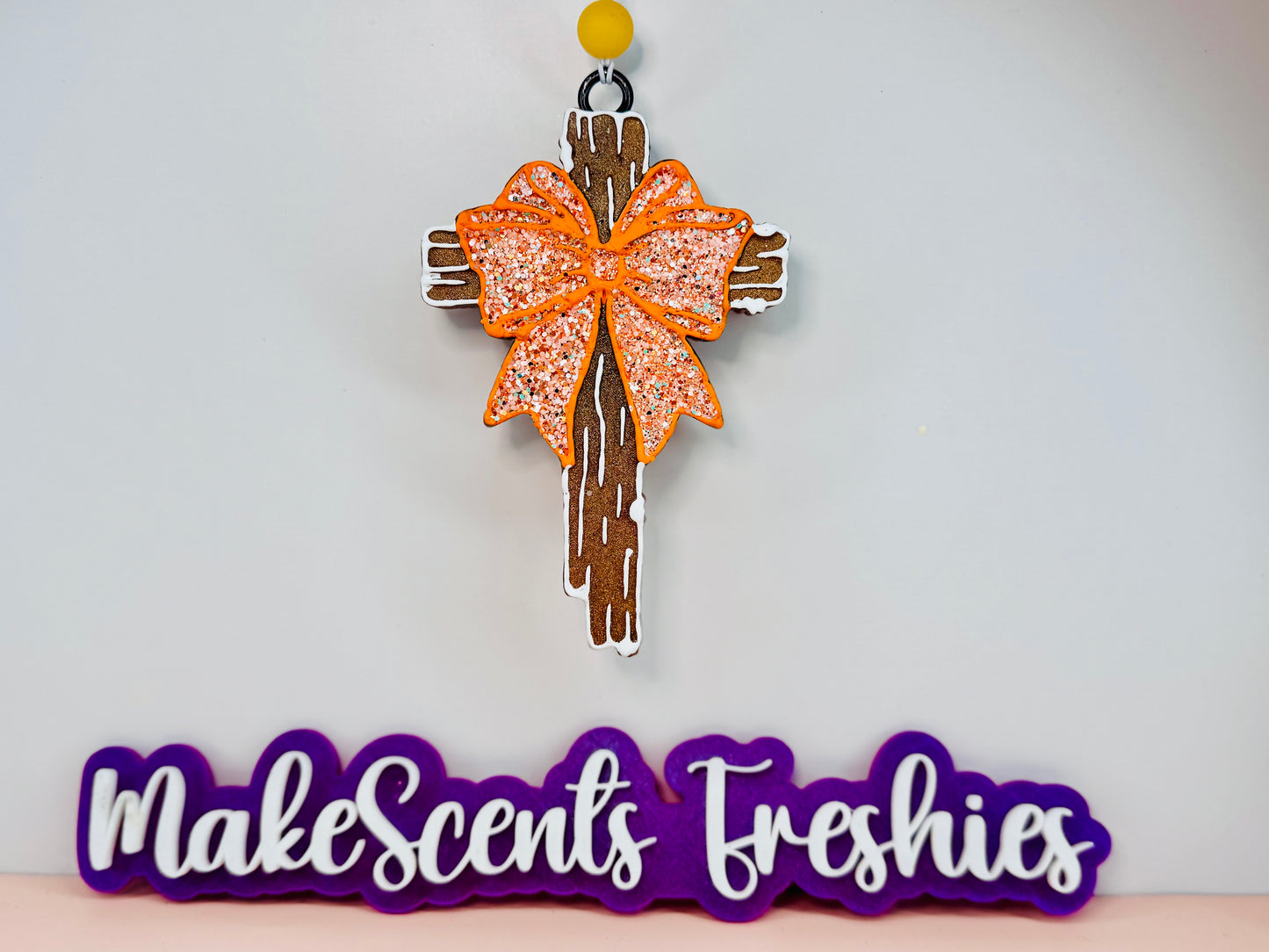 Wood cross with a bow