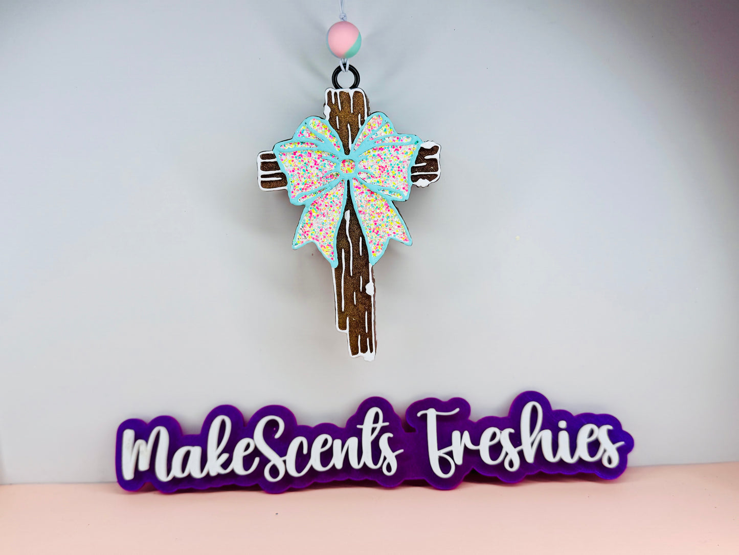Wood cross with a bow
