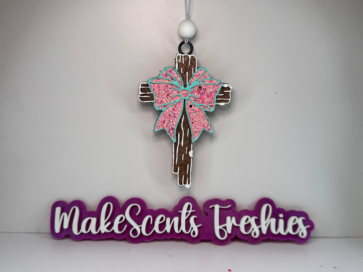 Wood cross with a bow